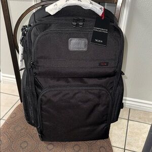 Tumi Black Backpack with Professional Design and Organization